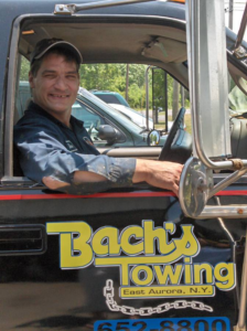 Individual working with Bachs Towing Company
