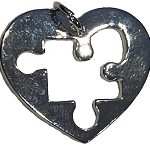 Autism puzzle piece cut out heart charm